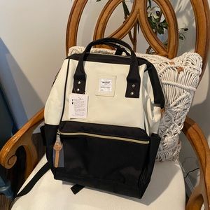 White and black backpack